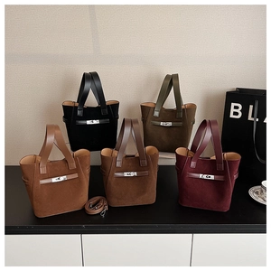 Five assorted bucket bags in matte finish with metal clasps and detachable straps