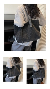 Side view of a vintage large tote bag in black marble texture worn on the shoulder