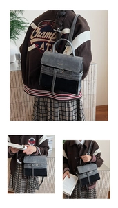 Detail view of vintage contrast handbag with retro buckle and adjustable straps