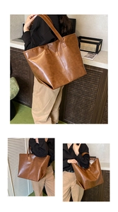 Detailansicht der braunen PU-Ledertasche mit eleganter Textur und Ziernähten