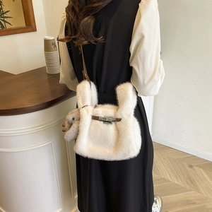 White fluffy plush bucket bag with cute rabbit ears and brown leather shoulder strap