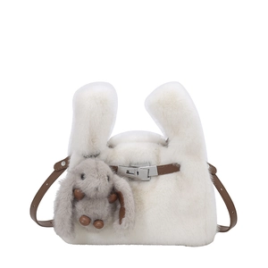 White plush bucket bag with cute bunny ears, leather strap and fluffy rabbit charm decoration