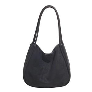 Minimalist black suede oversized tote bag with long straps for versatile casual wear