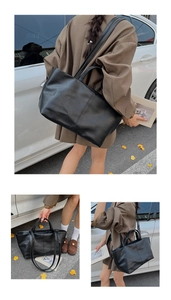 Detail of minimalist black PU leather tote bag with vertical stitching and smooth texture