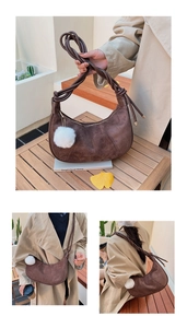 Brown suede crescent bag with plush ball charm and woven strap shown in lifestyle views