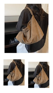 Detail showing the slouchy drape and texture of the brown suede oversized tote bag