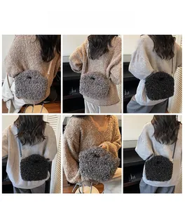 Model wearing gray and black plush faux lamb wool shoulder bags for autumn outfits
