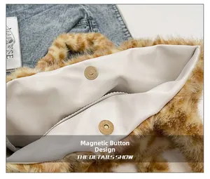 Detail view of the leopard print plush bag featuring functional magnetic metal closures
