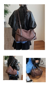 Vue détaillée du sac Boston en daim marron foncé montrant la texture et la sangle