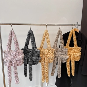 Plush faux fur tote bags in colorful animal prints and solid tones for women