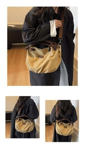 Detail of vintage ginger canvas tote showing leather handles and large metal eyelets