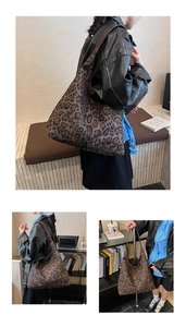 Macro shot of large leopard print tote bag featuring premium faux suede and leather strap
