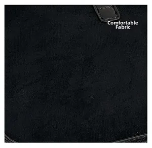 Close-up of the black matte suede fabric texture on this vintage crescent shoulder bag