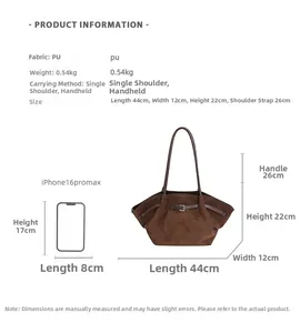 Size comparison of brown suede tote bag with iPhone 16 Pro Max and dimensions