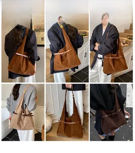Detailed model views of a large suede tote bag with leather strap buckle and retro hobo design