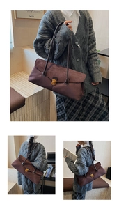 Detailed views of vintage burgundy suede Boston bag featuring elegant gold hardware locks