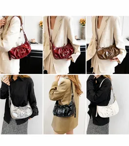 Collage of glossy half-moon underarm bags in six colors with stylish lace-up pleat details