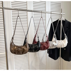 Detailed display of five color hobo bags featuring trendy front lace-up design