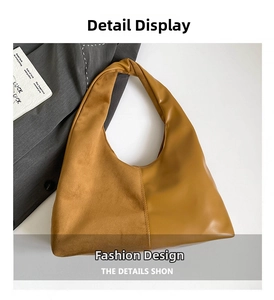 Close-up of caramel tote bag featuring oil wax leather and suede patchwork design
