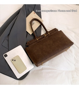 Brown vintage suede tote bag shown with iPad and phone for size scale comparison