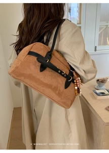 Brown suede Boston bag with colorful wooden beads and minimalist retro vibe details
