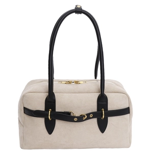Chic beige suede handbag with black leather accents and golden buckles for women