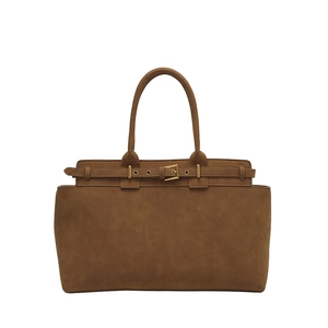 Classic brown faux leather tote bag with stylish decorative metal buckle straps and handles