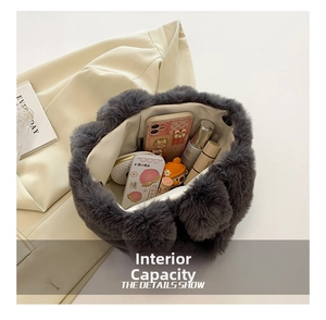 Interior view of the plush grey faux fur bucket bag showing large storage capacity