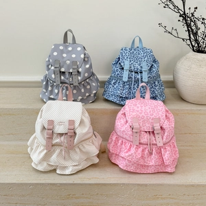 Chic polka dot and leopard print high-capacity backpacks with ruffle trim and buckles
