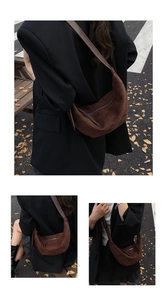 Deep brown suede crescent crossbody bag shown in outdoor street style fashion photography