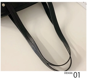Close-up of black leather shoulder straps with neat stitching on a bowling bag