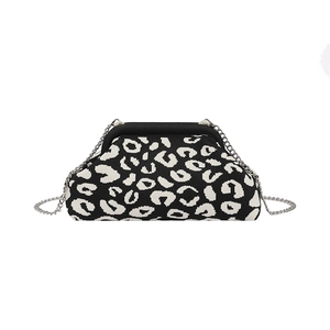 Leopard print knit seashell bag with silver metal chain strap in black and white