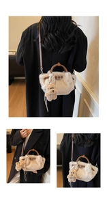 Detail of plush bucket bag with teddy charm, faux fur texture and leather strap