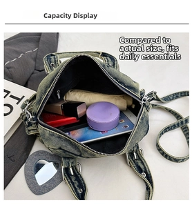Macro view of washed denim crossbody bag interior showing spacious daily essentials storage
