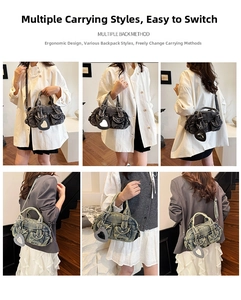 Retro washed denim crossbody bag featuring dual handles and heart mirror pendant detail