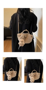 Detail of plush bucket bag in light brown with leather handle and dog charm