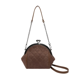 Borsa a conchiglia vintage in pelle scamosciata marrone con telaio in metallo