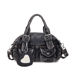 Retro black denim bowling bag with cargo pockets and heart mirror charm for women