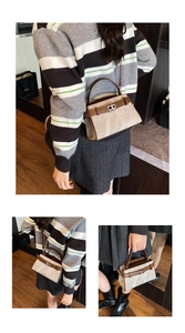 Detail of the chic metal CD buckle and adjustable strap on the khaki crossbody handbag