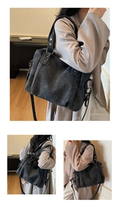 Détail du sac cabas gris anthracite rétro avec rivets argentés vintage et texture cuir mat