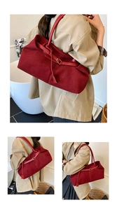 Close-up of burgundy corduroy tote bag featuring retro vertical textures and leather straps
