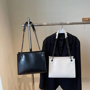 Chic quilted tote bags with metal chains in black and white for daily casual wear