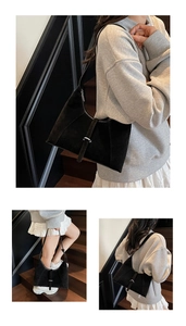 Three views of a black crescent shoulder bag with lychee texture and buckle detail