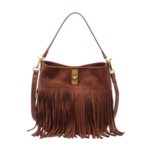 Brown faux suede fringe tote bag with gold turn-lock and adjustable shoulder strap
