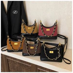 Quilted crossbody bags in five colors with gold chain straps and metal twist locks