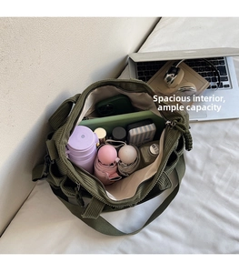 Interior view of army green corduroy tote bag showing large capacity for laptop and daily items