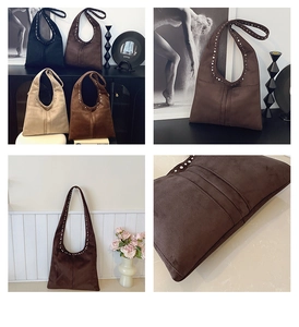 Gros plan sur un sac cabas en daim vintage avec rivets métalliques et texture douce