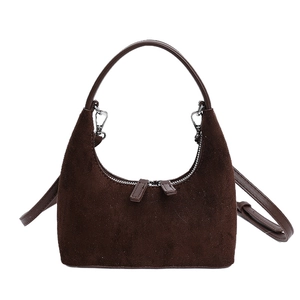 Brown matte crescent hobo bag with top handle and adjustable shoulder strap on white background