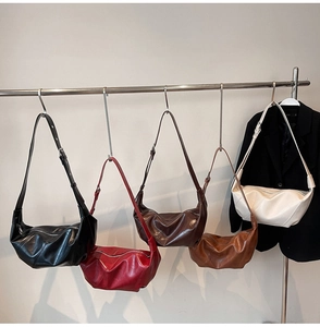 Detailed view of large hobo bags in five colors with textured leather and diagonal stitching