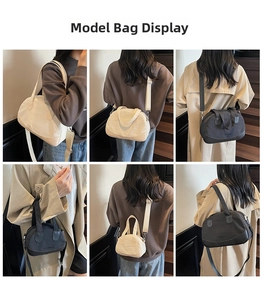 Mini shell bowling bag with top handles and adjustable wide strap shown on model